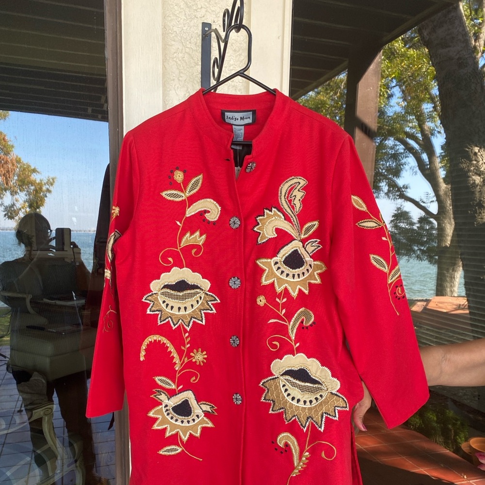 Indigo Moon Linen coat in red with embroidered details.
